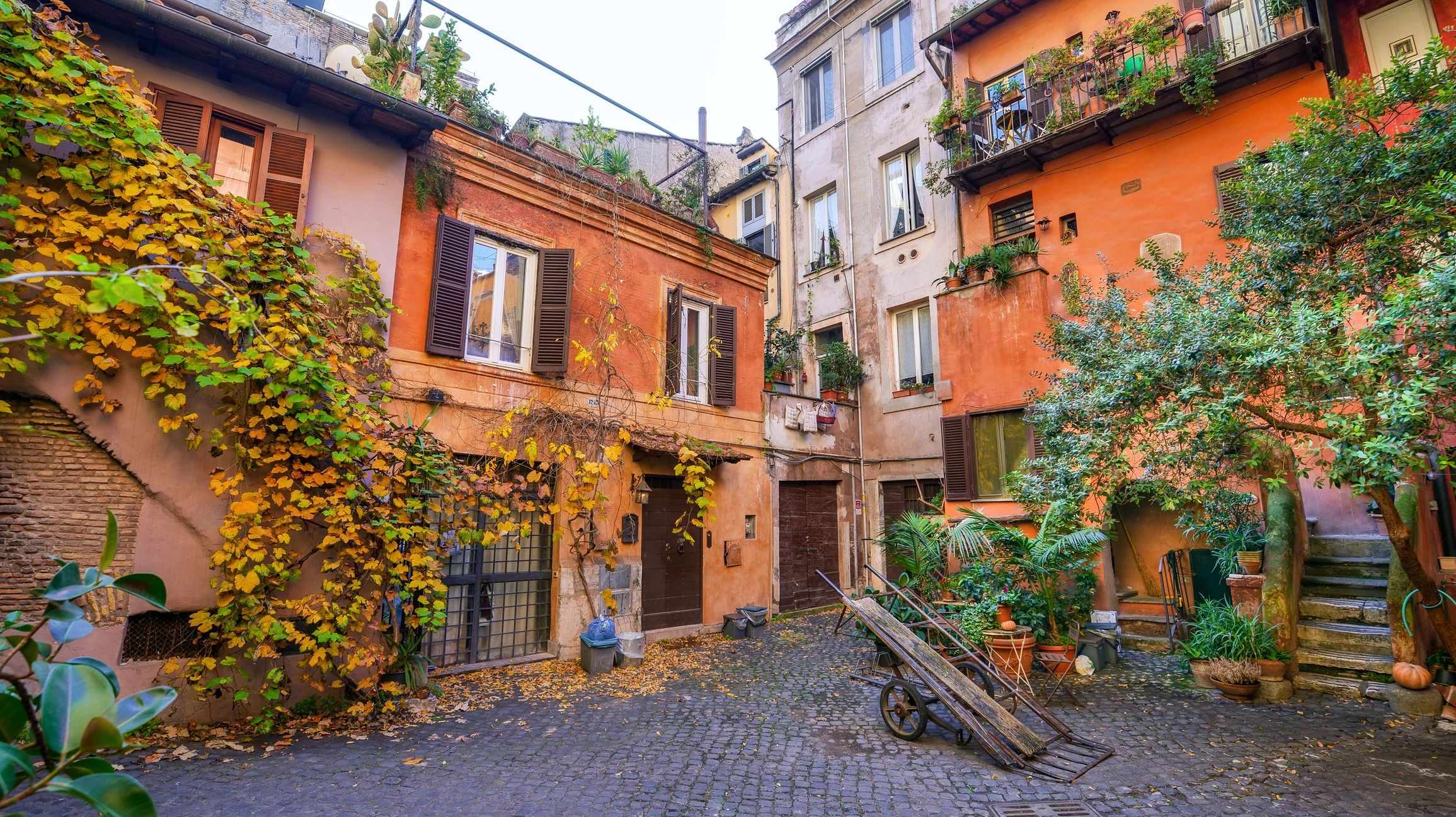 Quiet Rome street and small square in the morning light