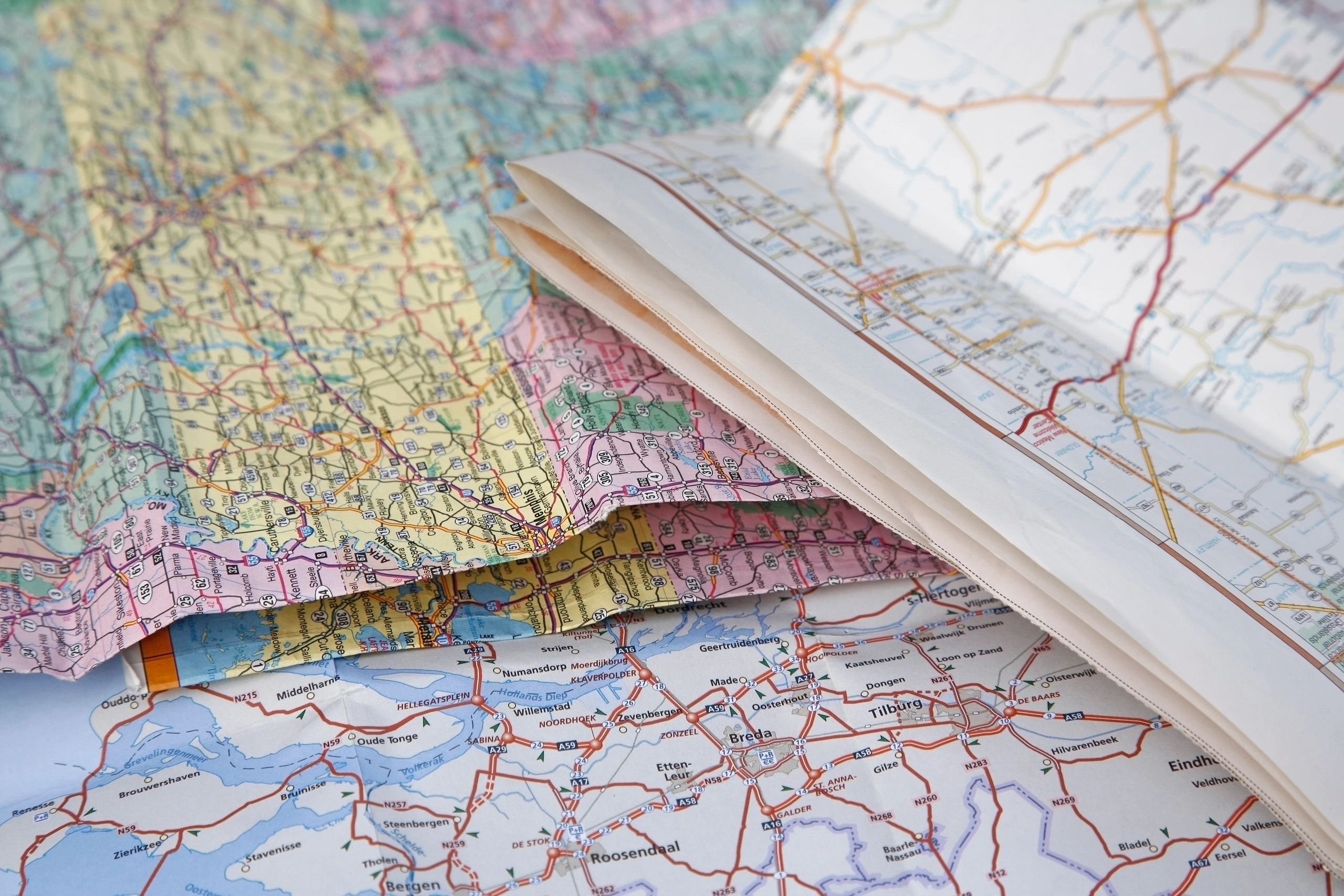 Close-up of road maps for travel planning