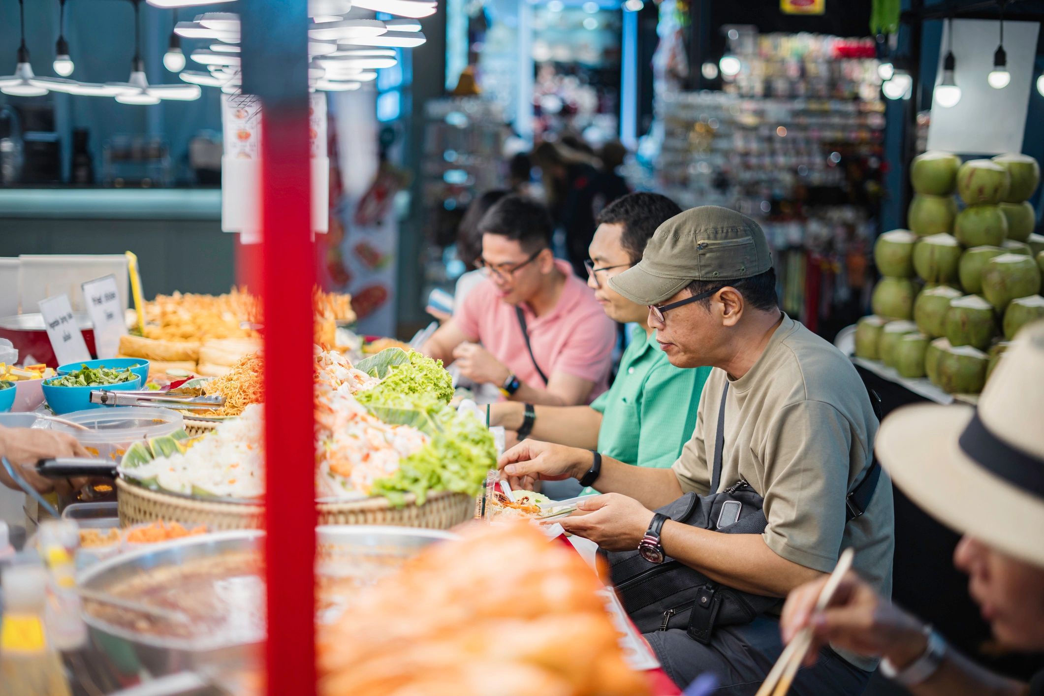 Street food vendor at a night market in Bangkok
