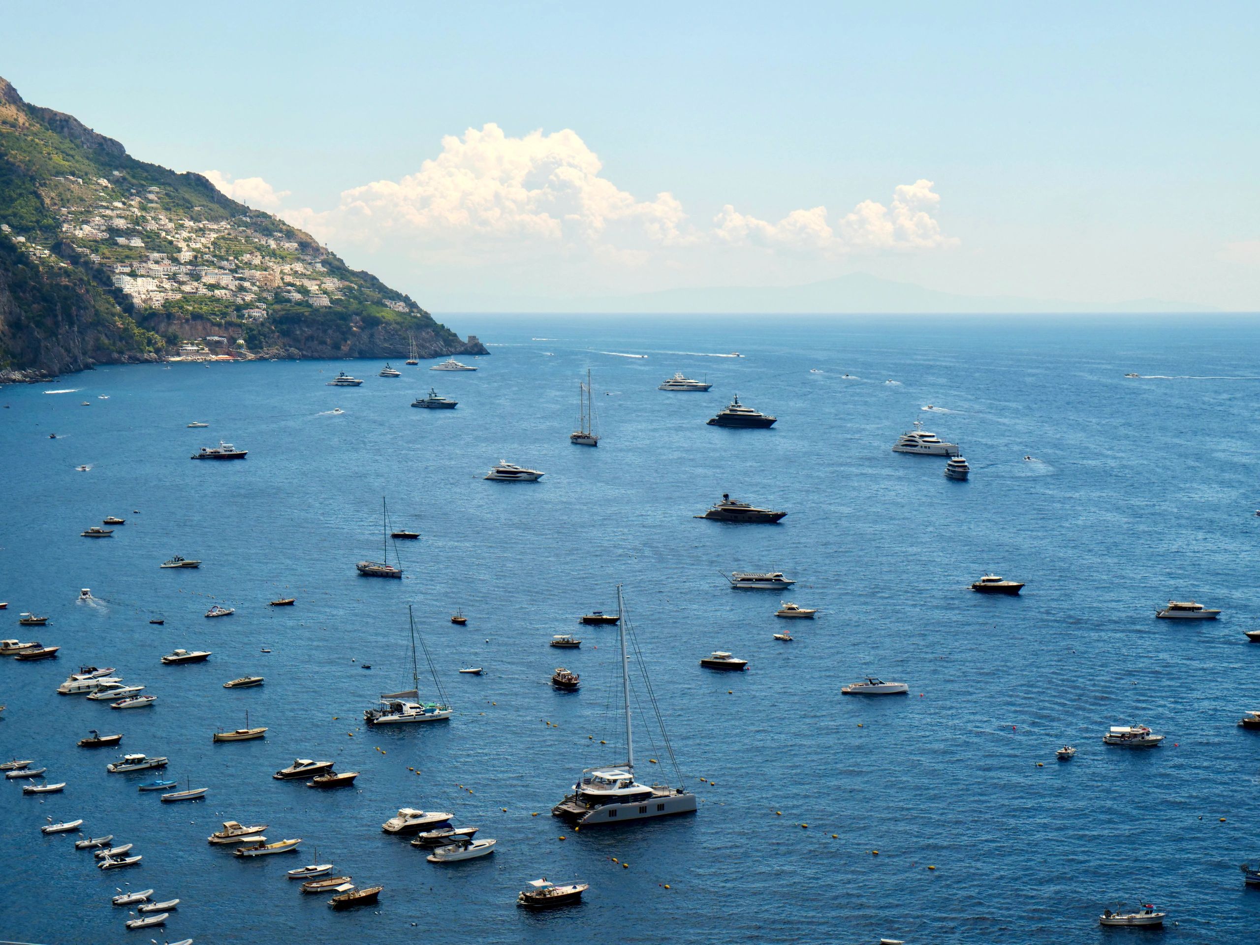 Panoramic view of the Amalfi Coast sea with boats