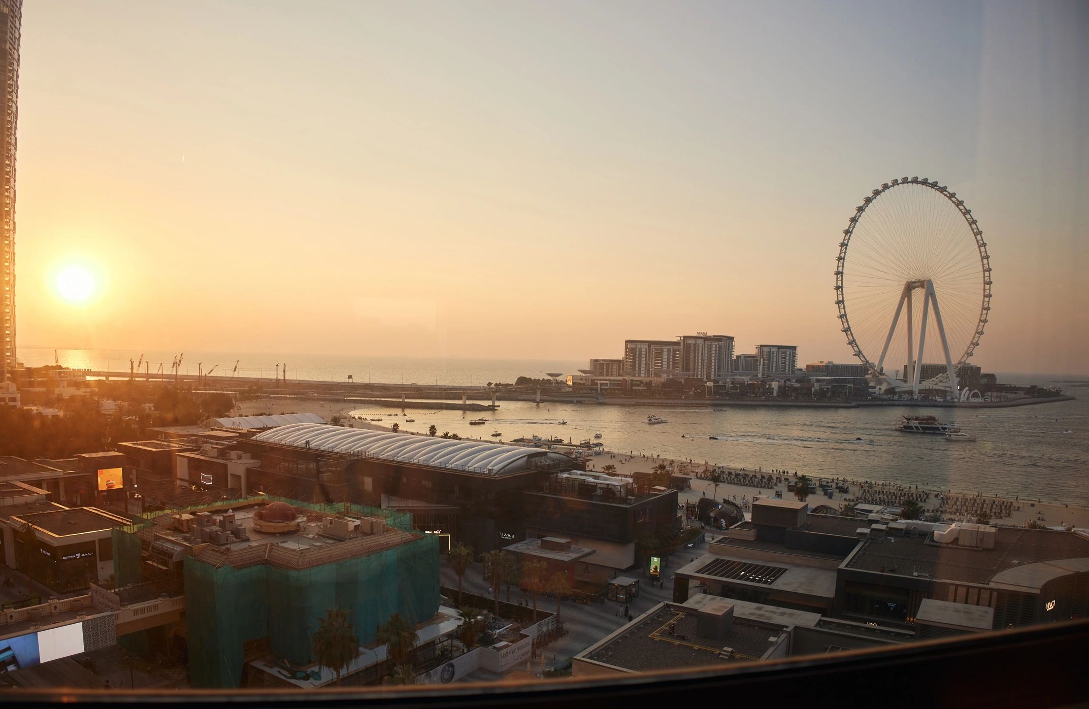Abu Dhabi waterfront skyline at sunset