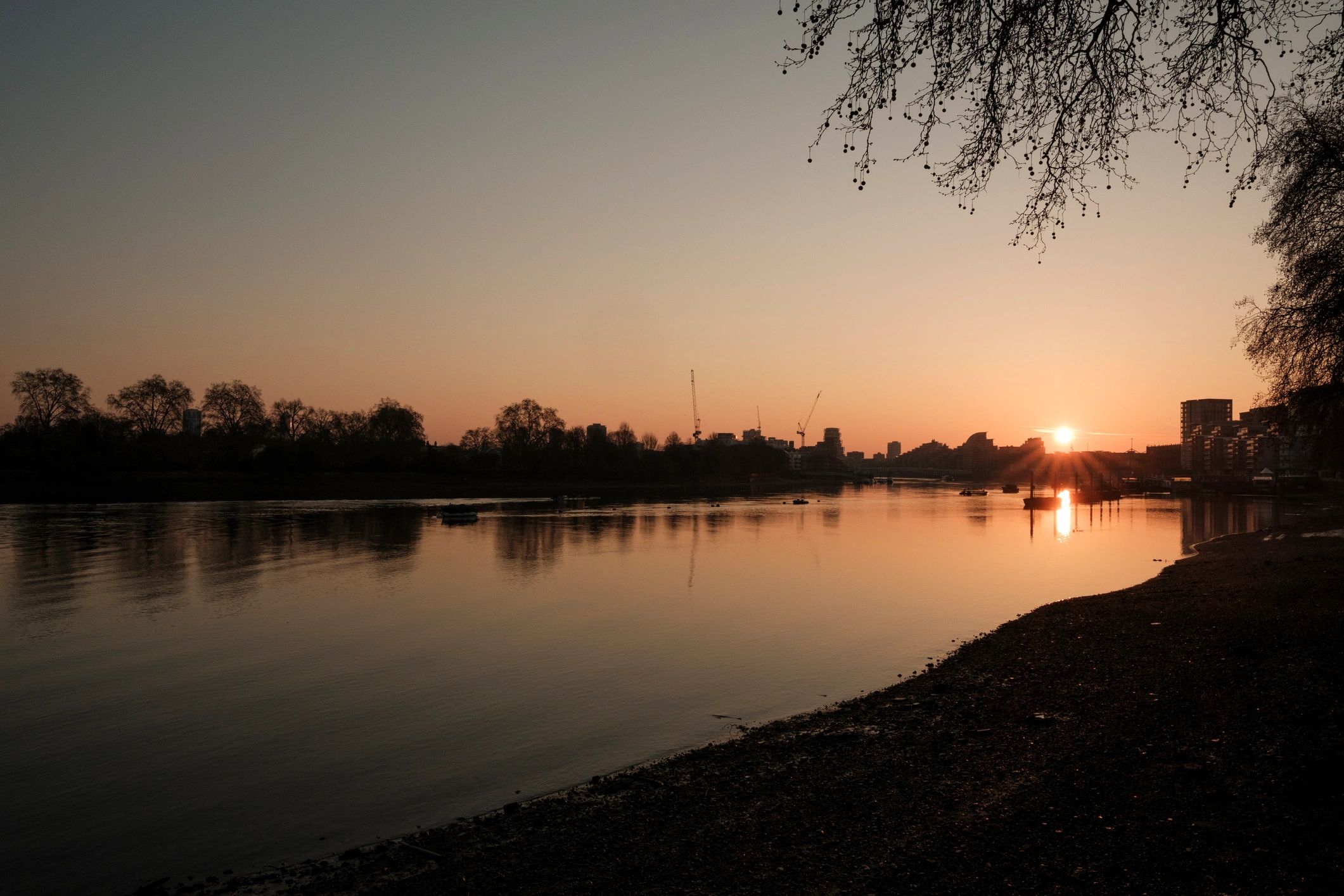 London skyline at sunset over the River Thames